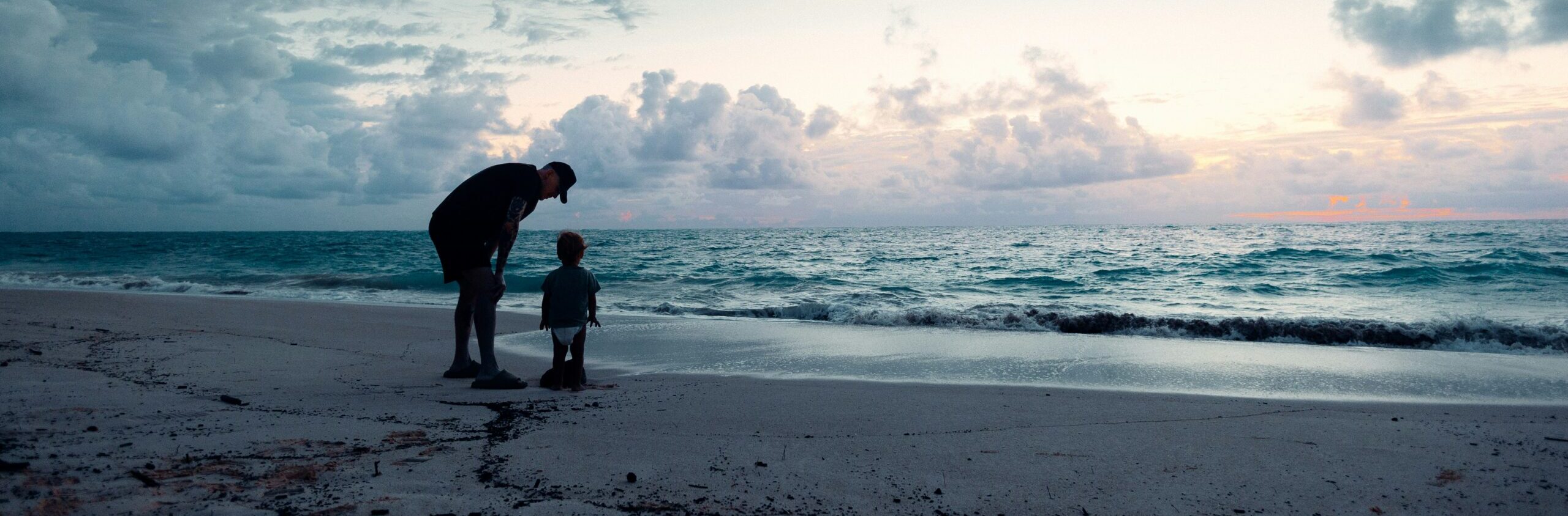 Father and child on beach. Father's Day in Rocky Point.